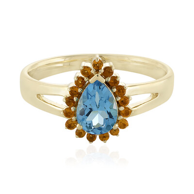 Anillo en oro con Topacio azul suizo (Adela Gold)