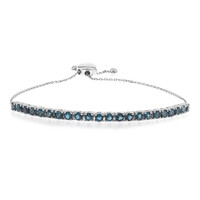Brazalete en oro con Topacio azul de Londres