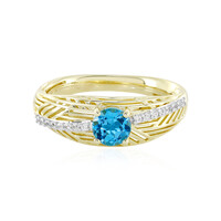 Anillo en oro con Topacio azul suizo (Ornaments by de Melo)
