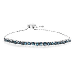 Brazalete en oro con Topacio azul de Londres