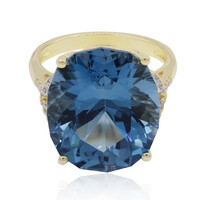 Anillo en oro con Topacio azul de Londres