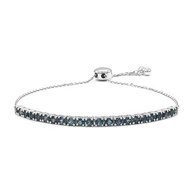 Brazalete en oro con Topacio azul de Londres