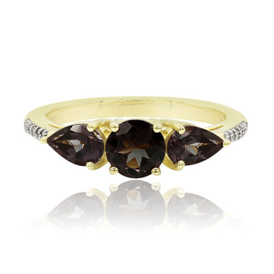 Anillo en oro con Granate de color cambiante